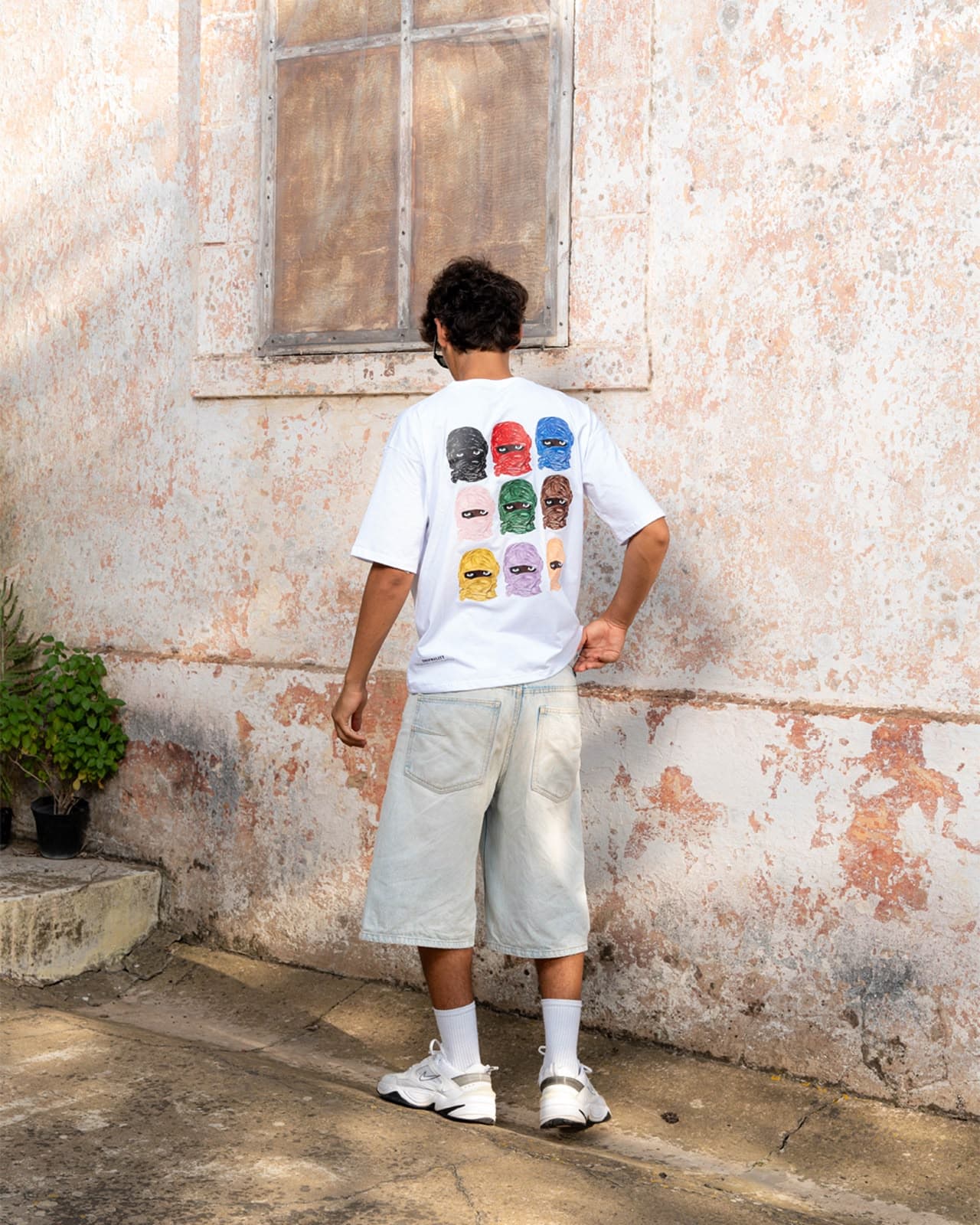 Dripnality’s Oversized Multi-Balaclavas White T-Shirt